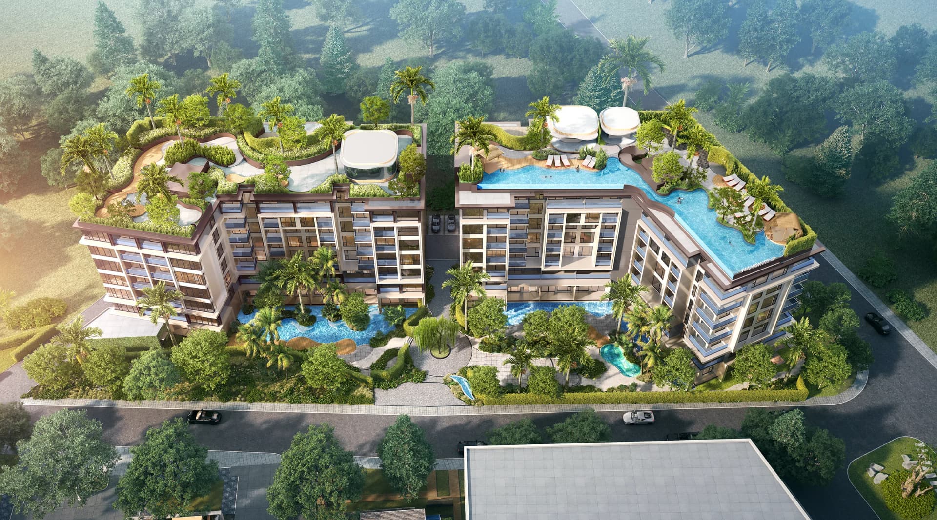 Both towers from above: the roof garden of Tower B and the rooftop pool of Tower A