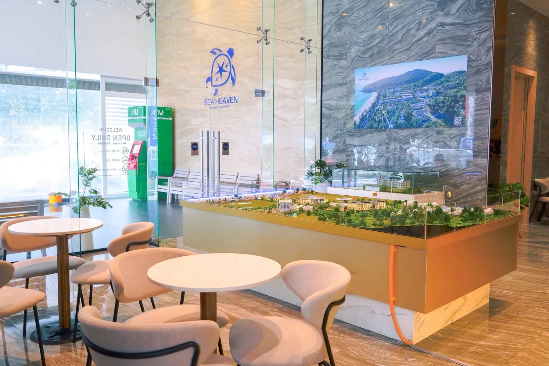 Sea Heaven sales gallery with the scale model of the project